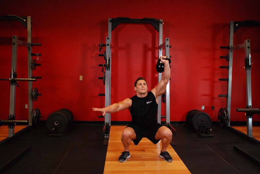 One-Arm Overhead Kettlebell Squats variant 2